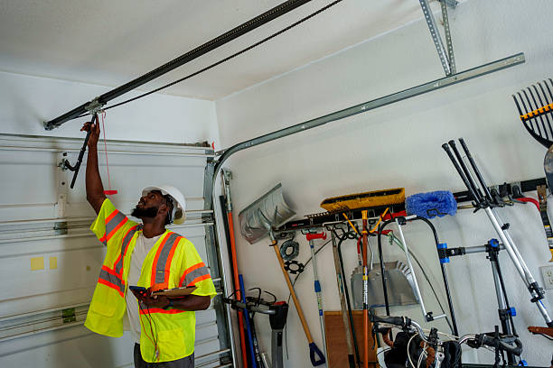Professional Garage Door Panel Replacement technician working in Riverside, IA